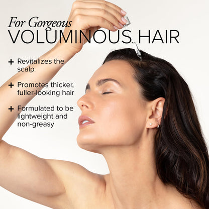 SeroVital scalp serum drops being applied with a dropper for hair thinning