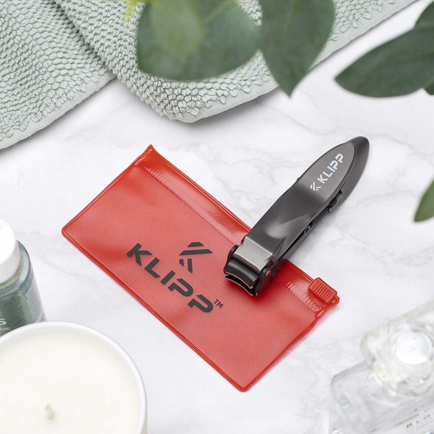 KLIPP self-collecting nail clipper with catch tray lid open