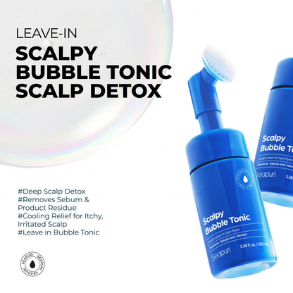 Seapuri scalp exfoliator foam showing the built-in silicone brush applicator for root massage