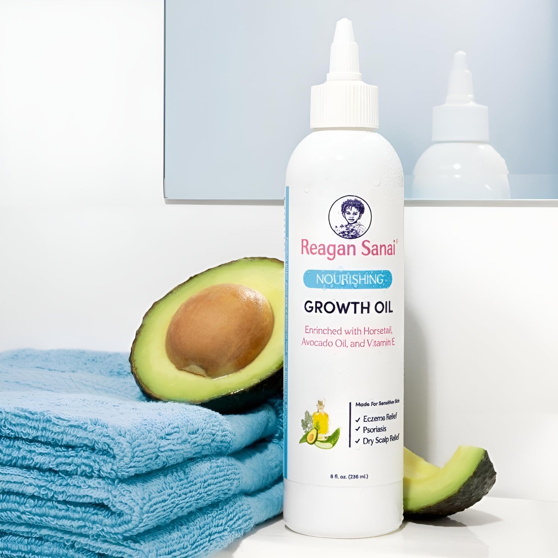 Reagan Sanai Nourishing Growth Oil showing lightweight texture for dry scalp relief