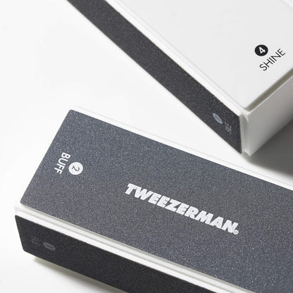 Tweezerman 4-sided nail buffer block showing color coded surfaces