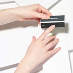 Close up of Tweezerman nail buffing block texture and labels