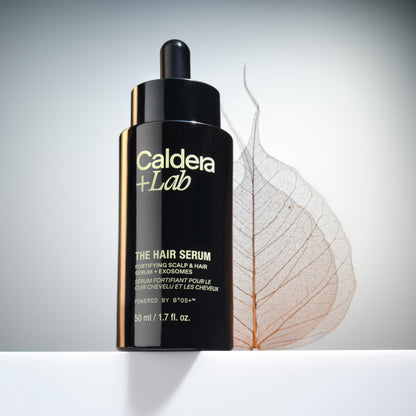 Side view of Caldera + Lab The Hair Serum highlighting plant exosome technology and ingredients.