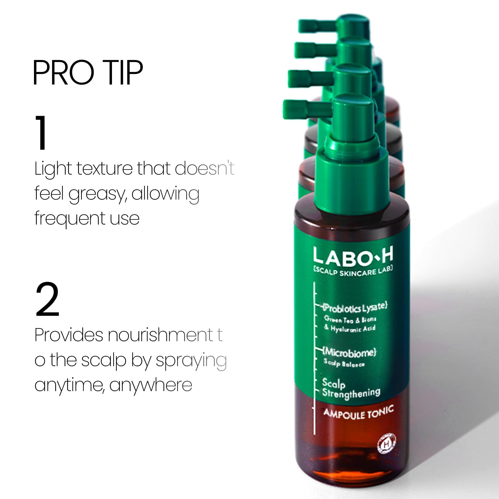 Applying LABO-H hair loss relief tonic directly onto the hair roots