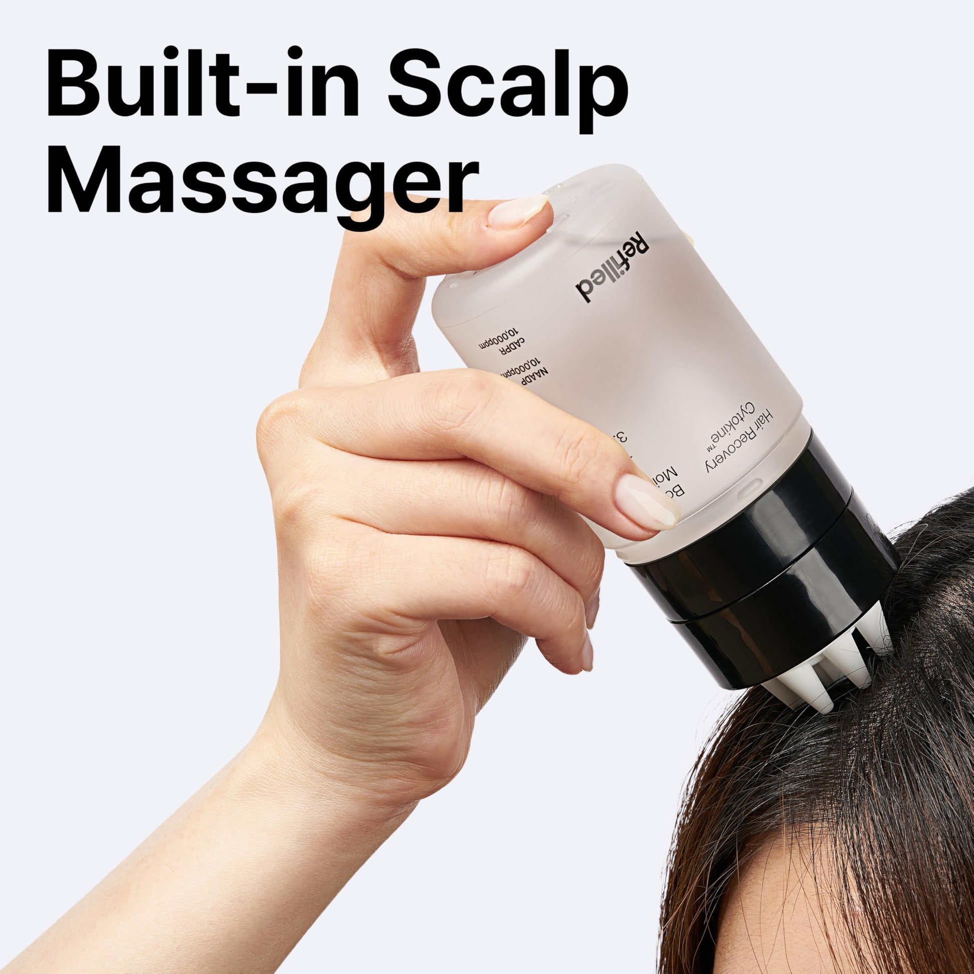Refilled Moisture Care scalp treatment demonstrating the targeted application on the hairline.
