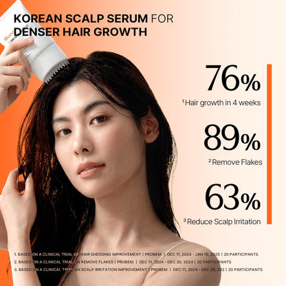 Korean hair care serum being massaged into the scalp using the built in tool.