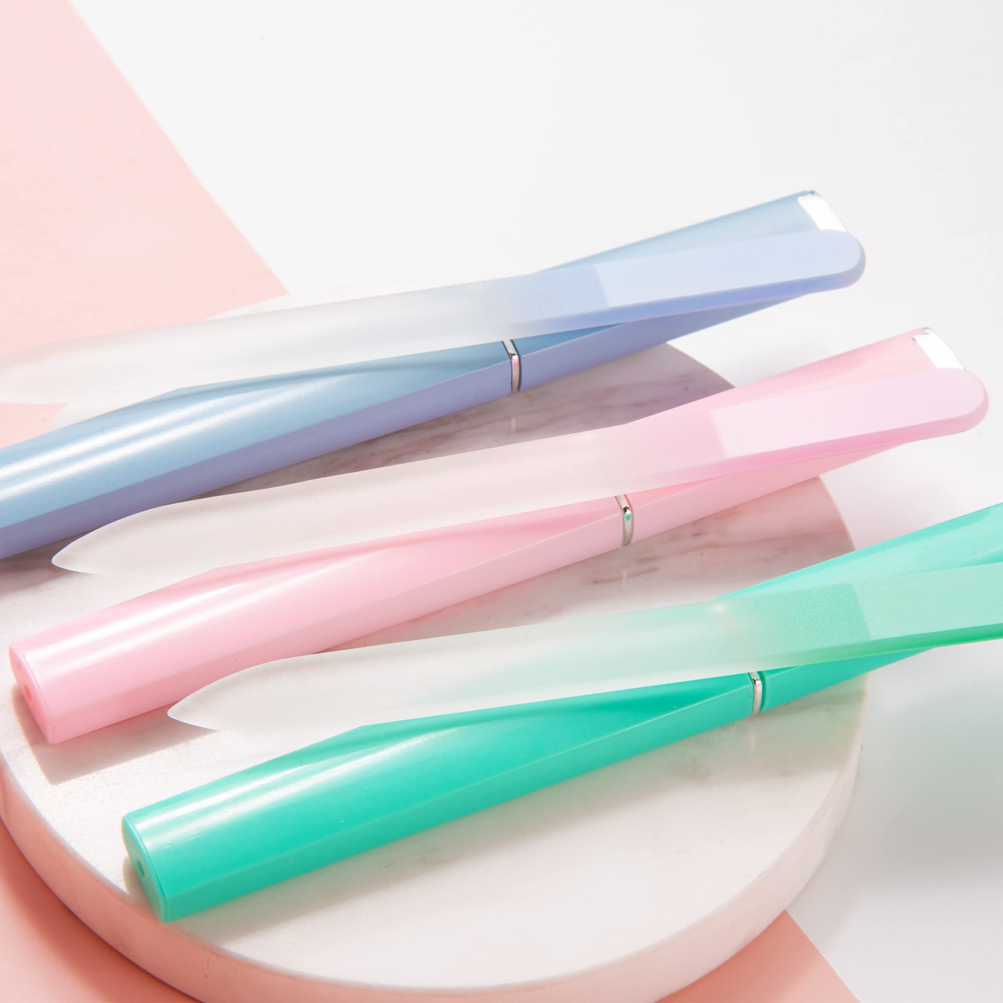 Three glass nail files with matching individual protective sleeves