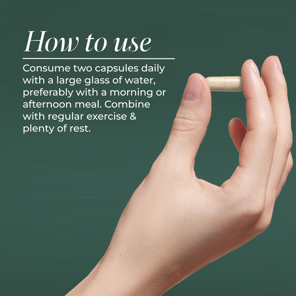 Primal Harvest Hair Growth Complex capsules poured out on surface