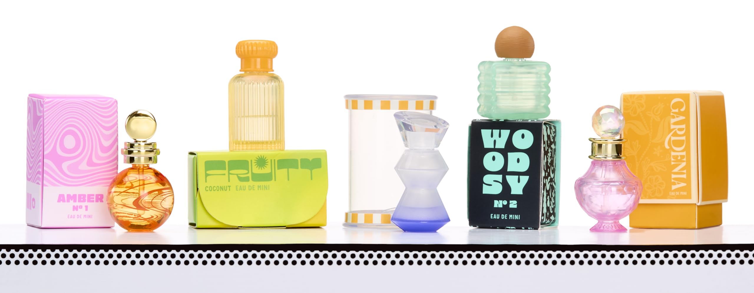 Closer shot of the five different scent theme bottles including Amber, Woodsy, and Floral.