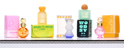 Closer shot of the five different scent theme bottles including Amber, Woodsy, and Floral.