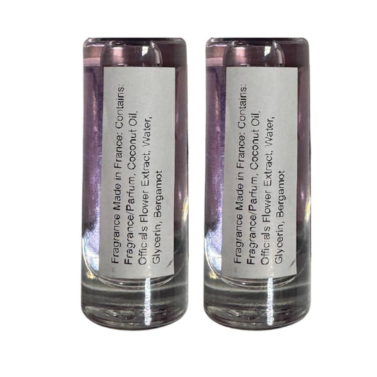 Travel size twelve milliliter fragrance oil rollers with secure caps for women