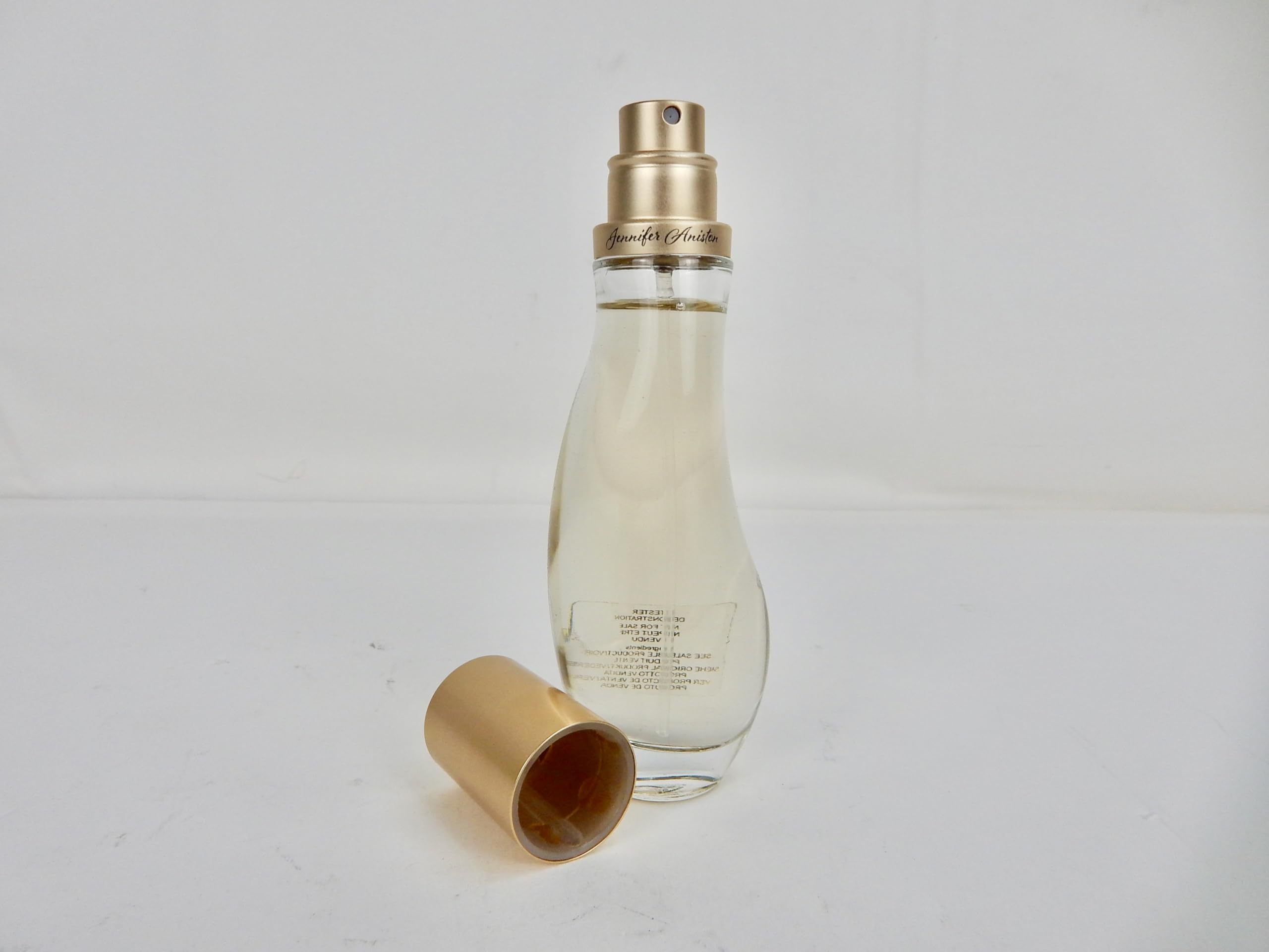 Jennifer Aniston Chapter One unboxed tester perfume bottle showing authentic fragrance liquid