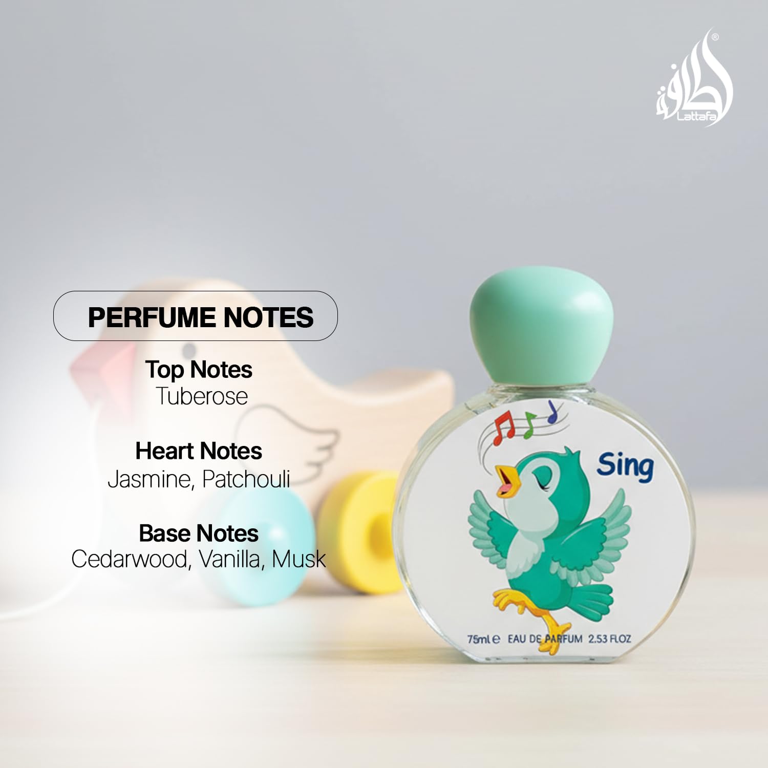 Side angle of the luxury Lattafa Sing unisex children perfume bottle highlighting the premium glass finish and round cap design.