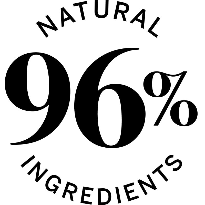 Close-up of the elegant oval tin canister detailing the ninety-six percent naturally derived formula