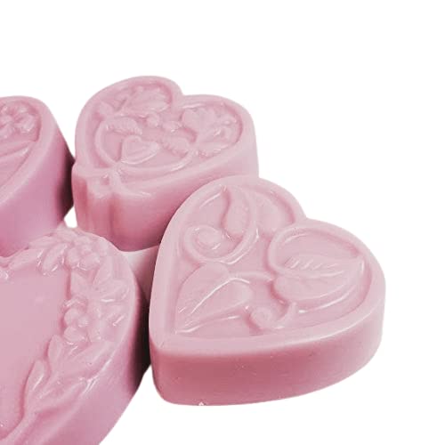 Close-up of the intricate floral embossing on the Carnation scented goat milk soaps