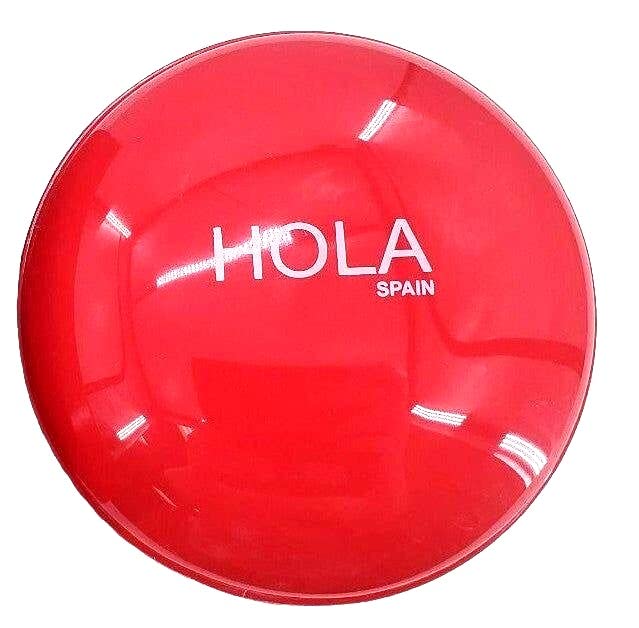 Close up view of the soft puff duster inside the Hola Spain perfumed powder packaging