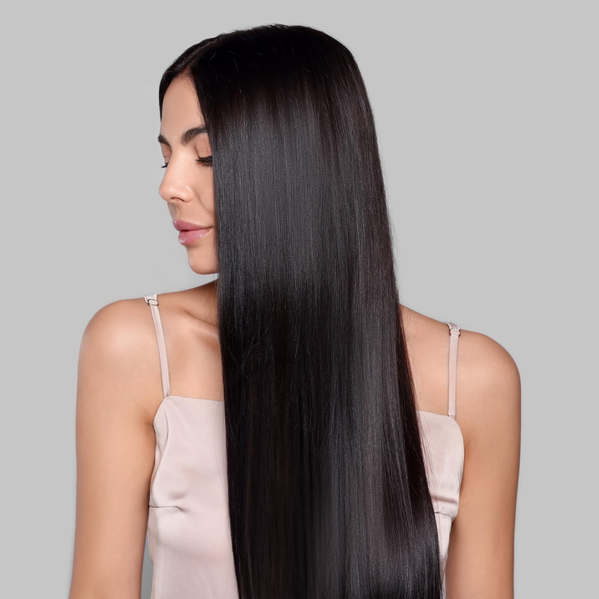 Kachita Spell Keratin spray bottle with professional hair styling tools