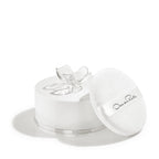 Oscar de la Renta signature scent luxury body powder for women displayed on vanity