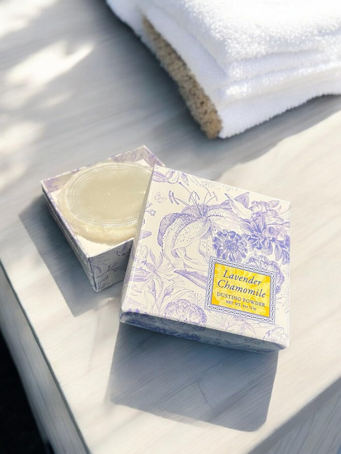 Talc-free body powder with lavender and chamomile essential oils close-up