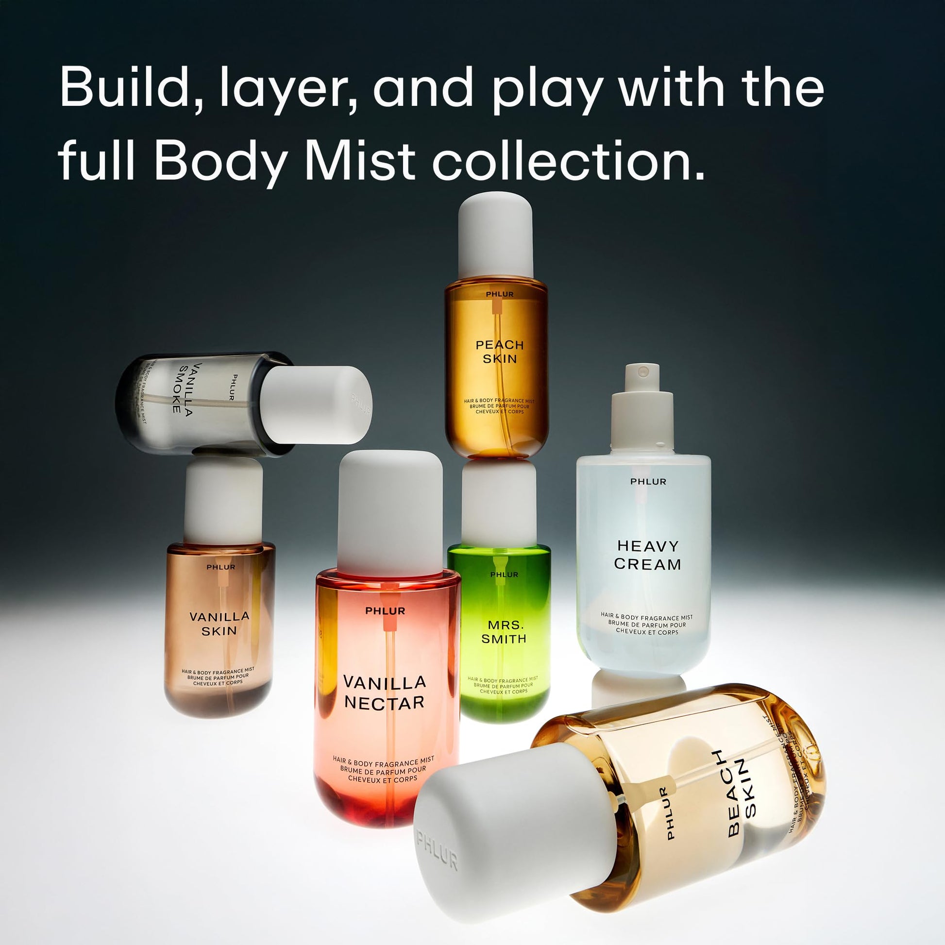 Travel friendly Phlur mist bottles displayed on a neutral background