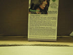 Side view of the Gentle Treatment No-Lye Conditioning Creme Relaxer system detailing contents and application instructions.
