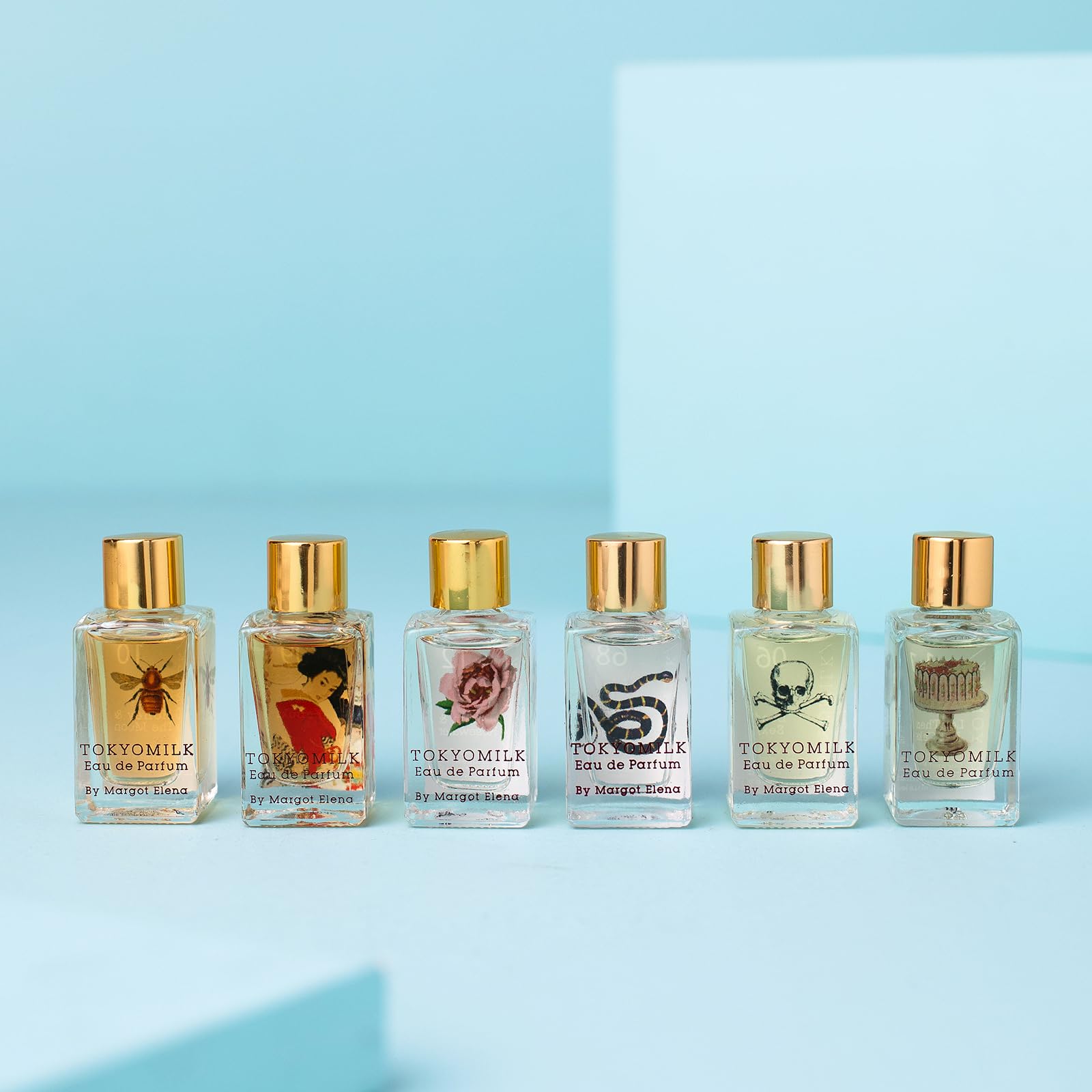 TokyoMilk miniature luxury perfume collection showing artistic bottle designs close up