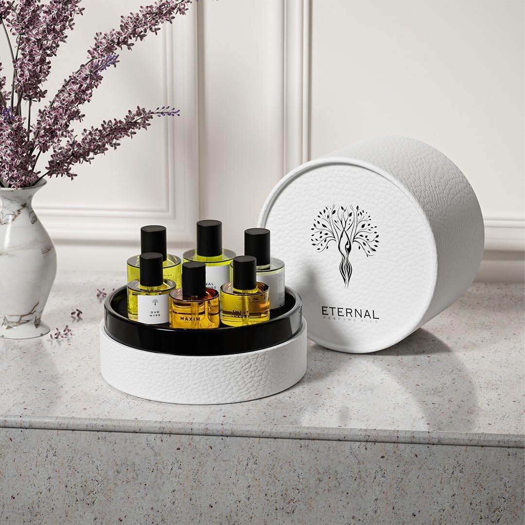 Close up of Eternal Perfume Oils bottles in cylindrical box