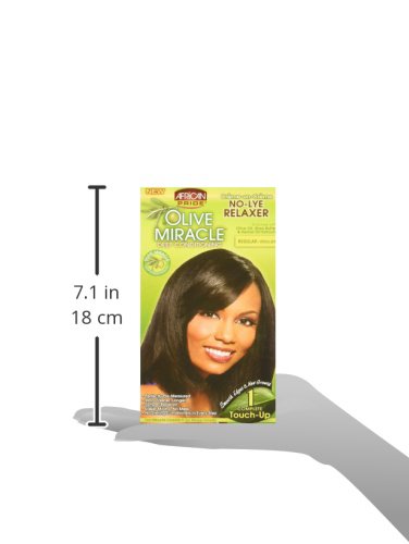 No-lye hair relaxer kit regular strength components with aloe vera, castor oil, and biotin ingredients visible
