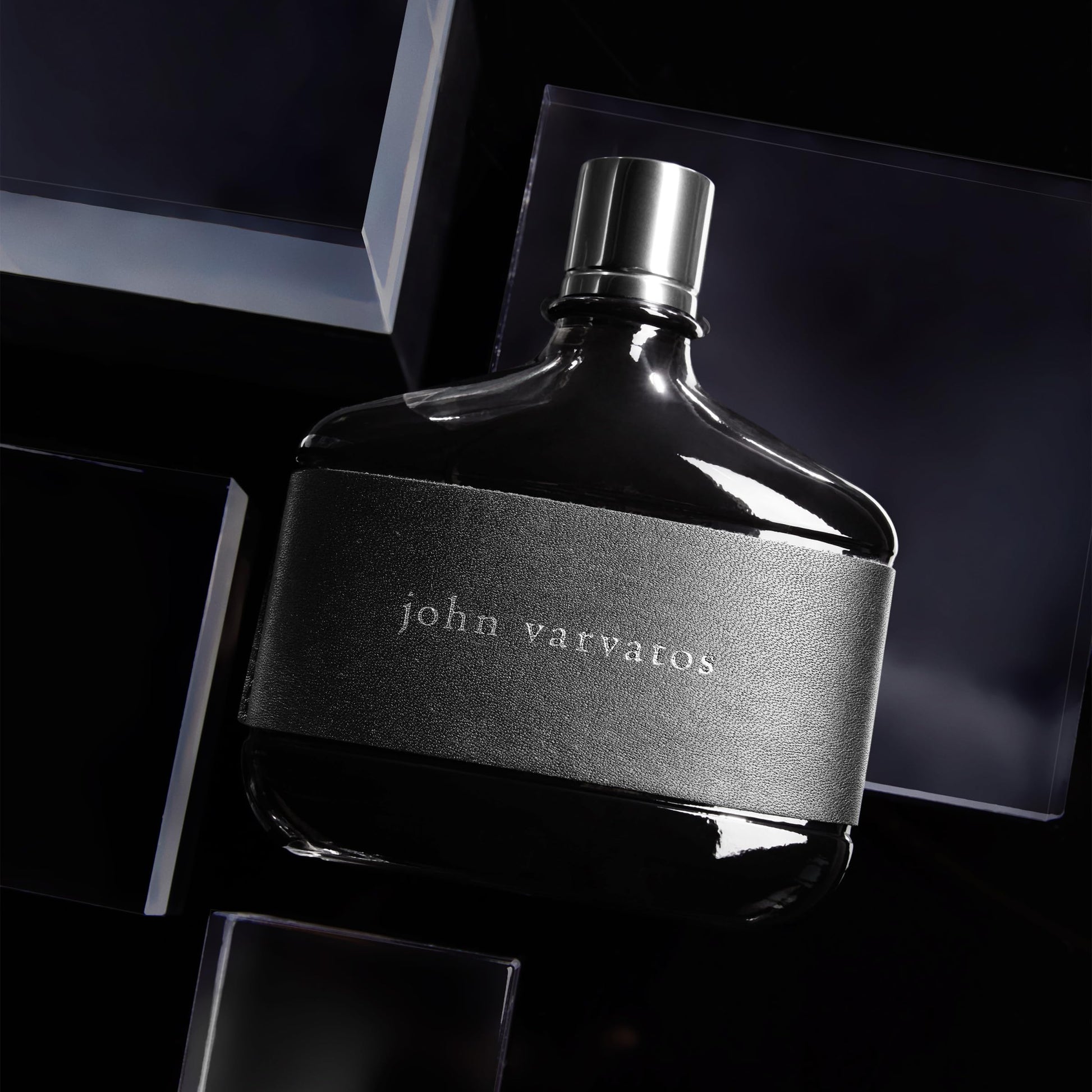 John Varvatos Men spicy woody perfume bottle on a clean backdrop