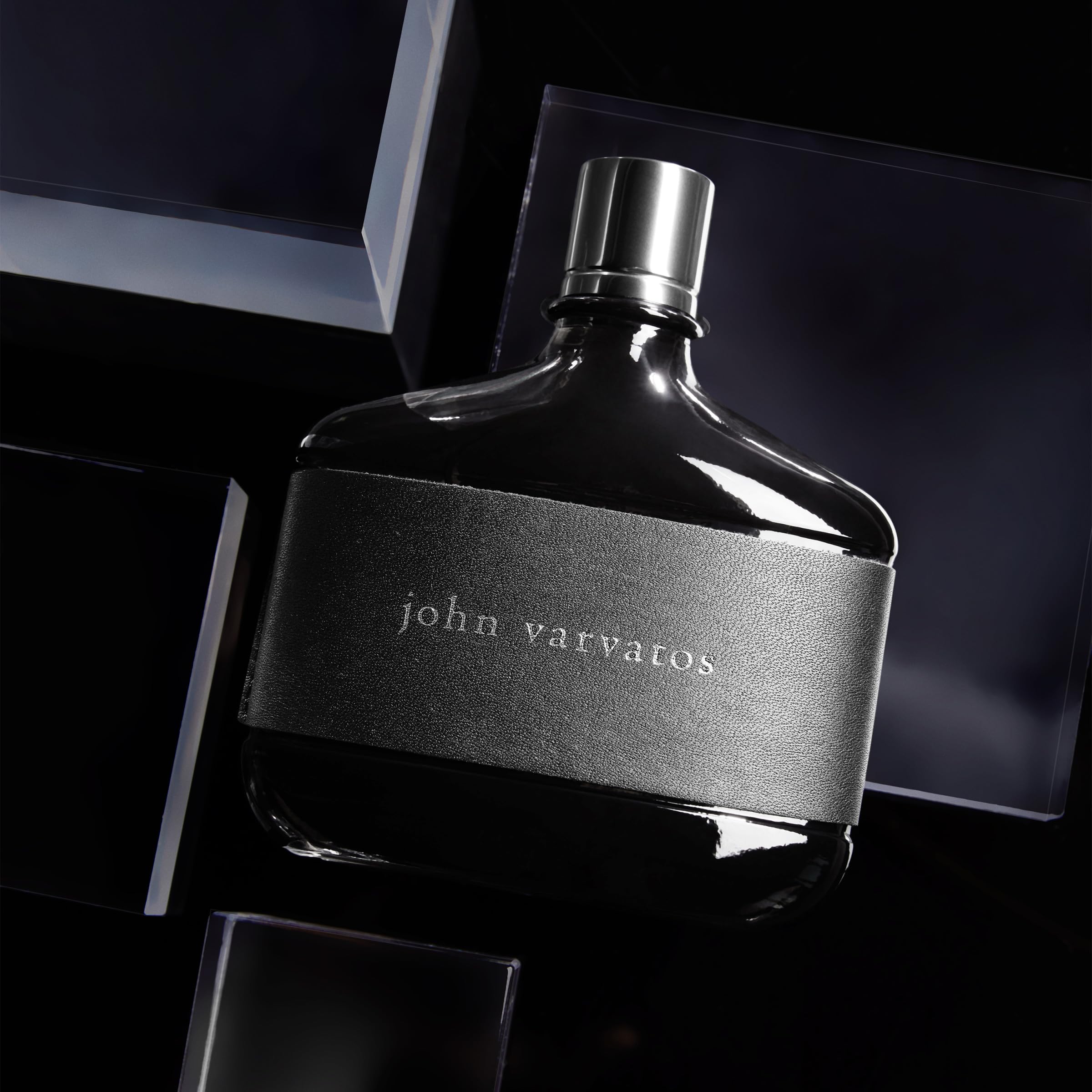 John Varvatos Men spicy woody perfume bottle on a clean backdrop