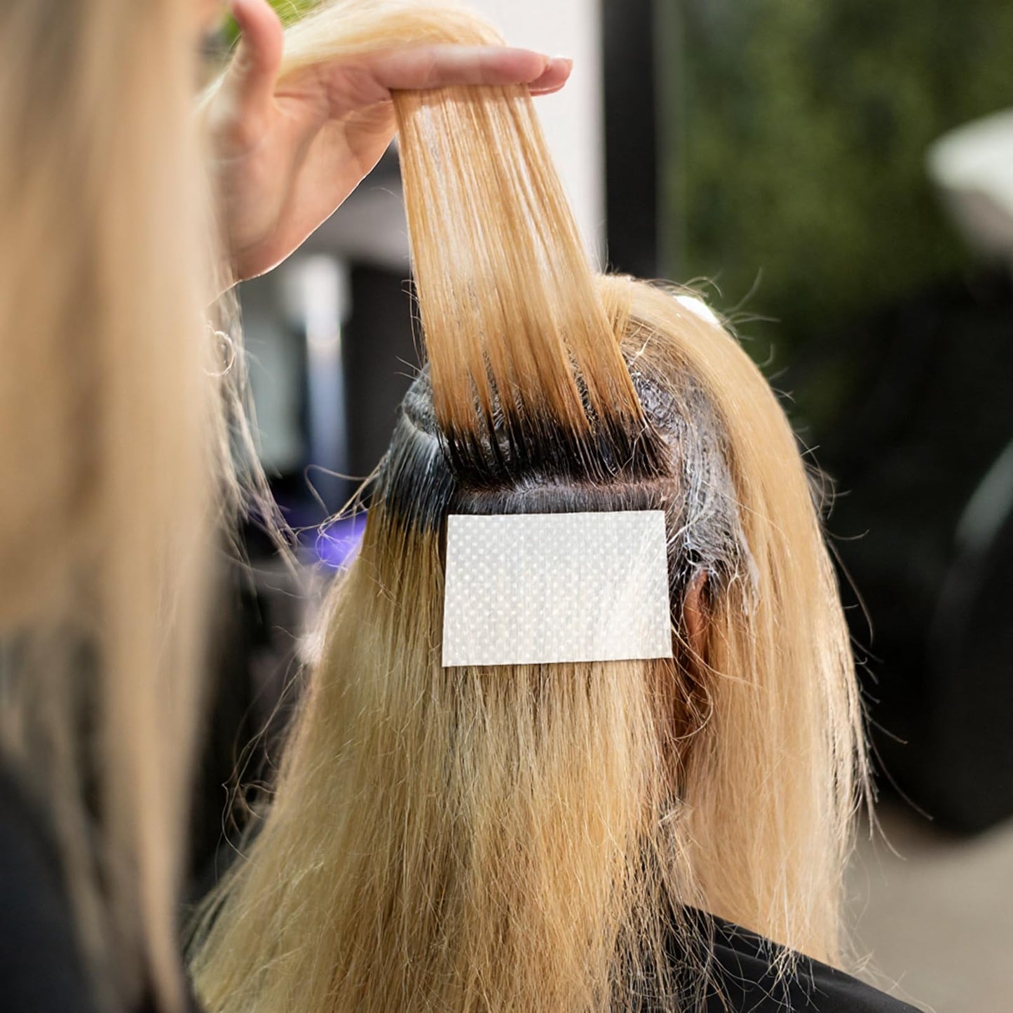 Measurement display of the 9.8 by 6.5 centimeter professional salon wrapping sheets.