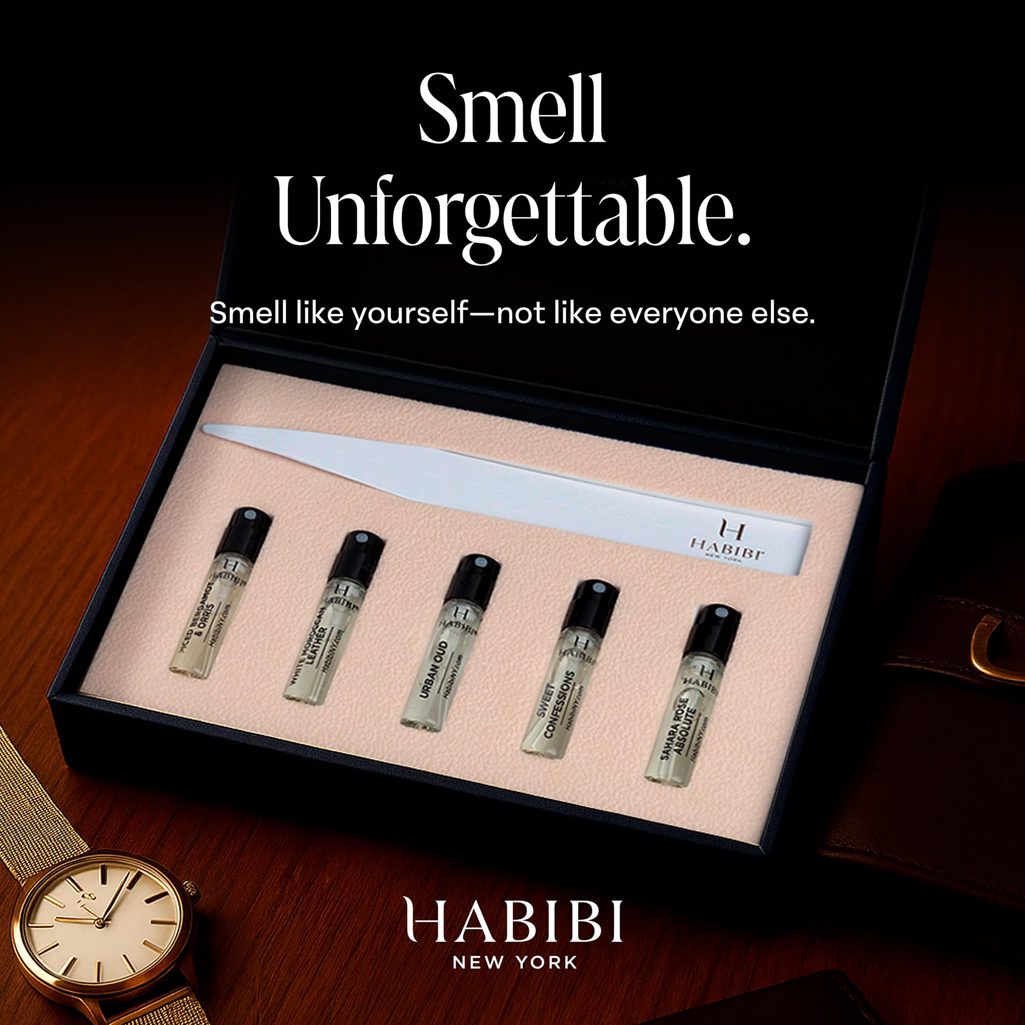 Close up shot of the H Habibi mini spray bottles highlighting the distinct fragrance names like White Moroccan Leather.