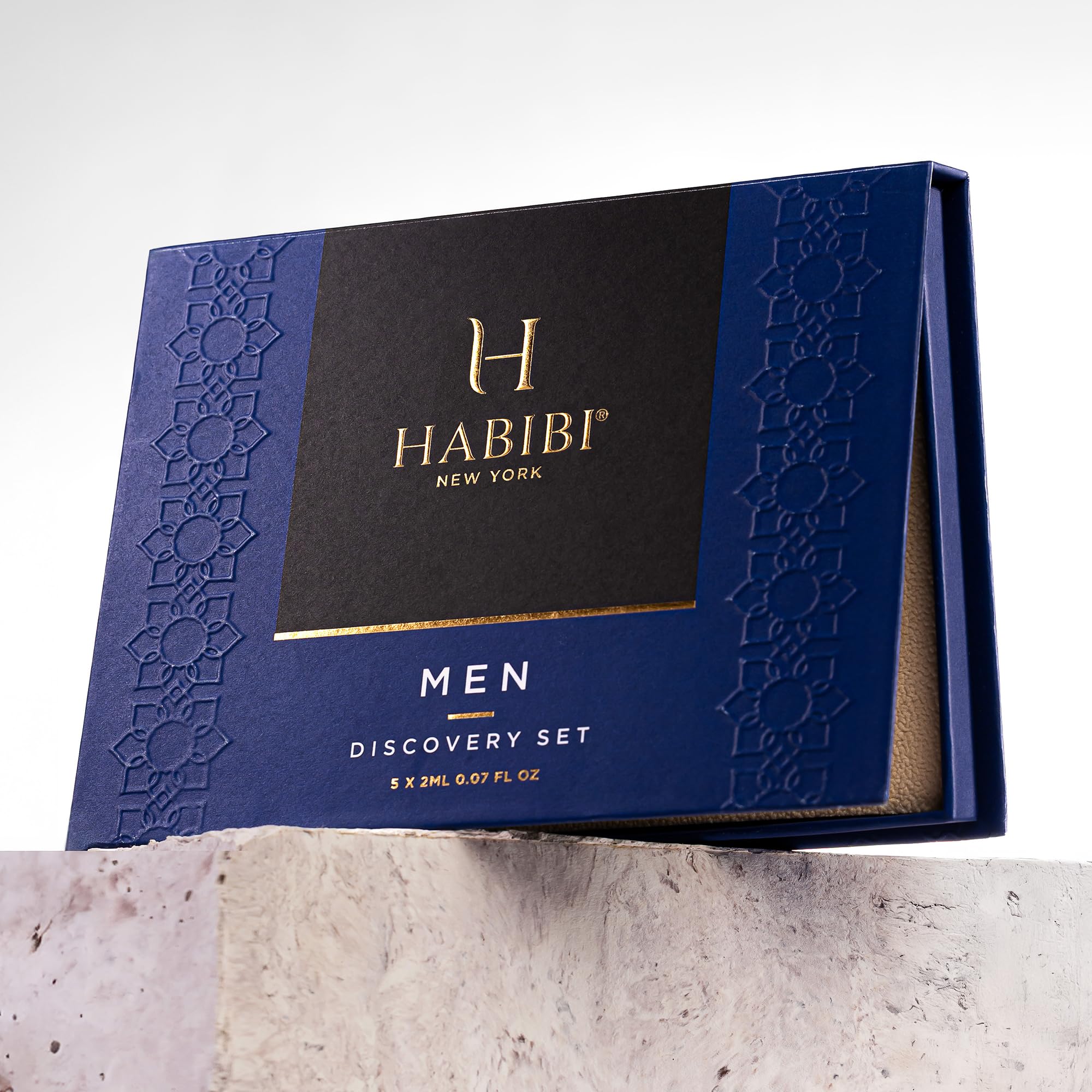 H Habibi men's perfume sample collection unboxed on a clean surface showcasing the elegant travel size presentation.