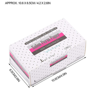 Close-up of the ultra-thin mesh texture of the salon perm paper sheets.
