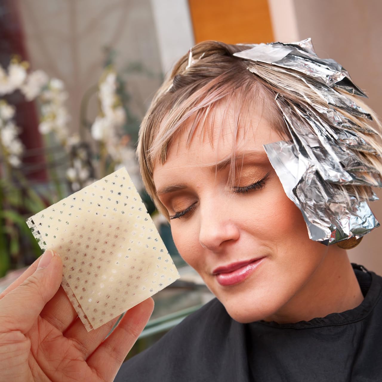 Disposable perming end wraps applied to hair tips on rollers