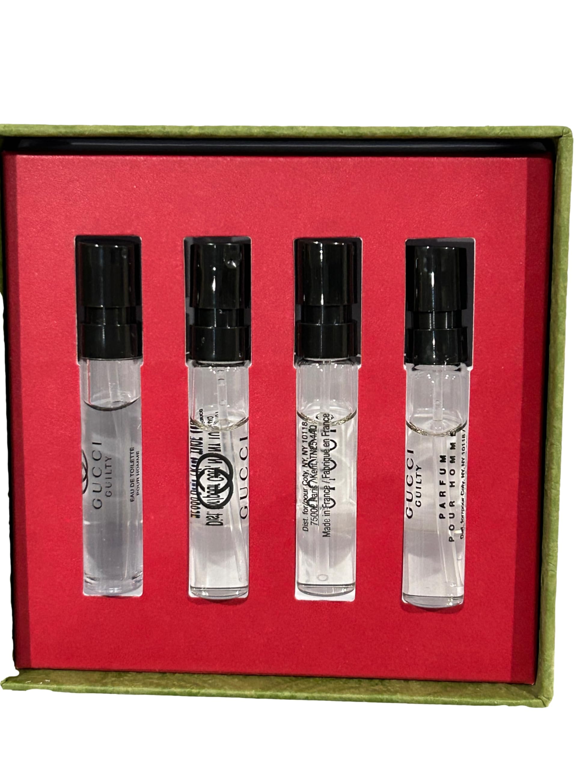 Four piece Gucci Guilty fragrance sample vials for men