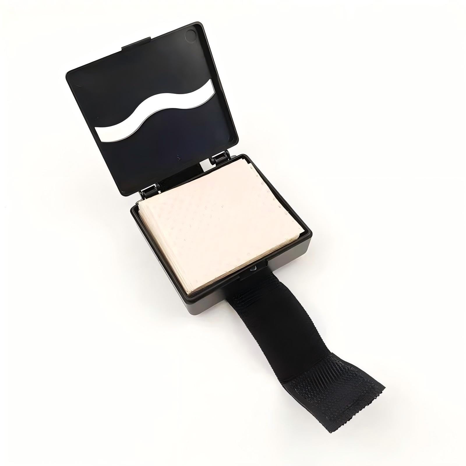 Secret Desire hair curling end papers being extracted from the portable wrist tissue holder.