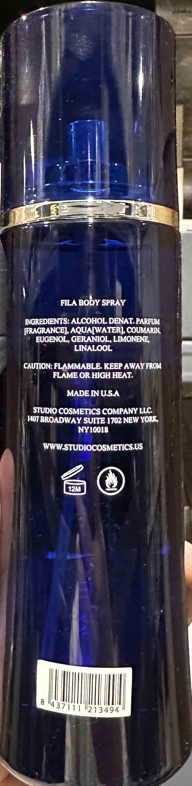 Side perspective of the imported FILA oriental scent body spray bottle for active lifestyles