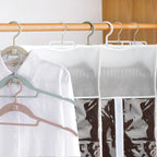 Kelukeya white weft hair holder inside the clear dust proof storage bag hanging in a closet wardrobe
