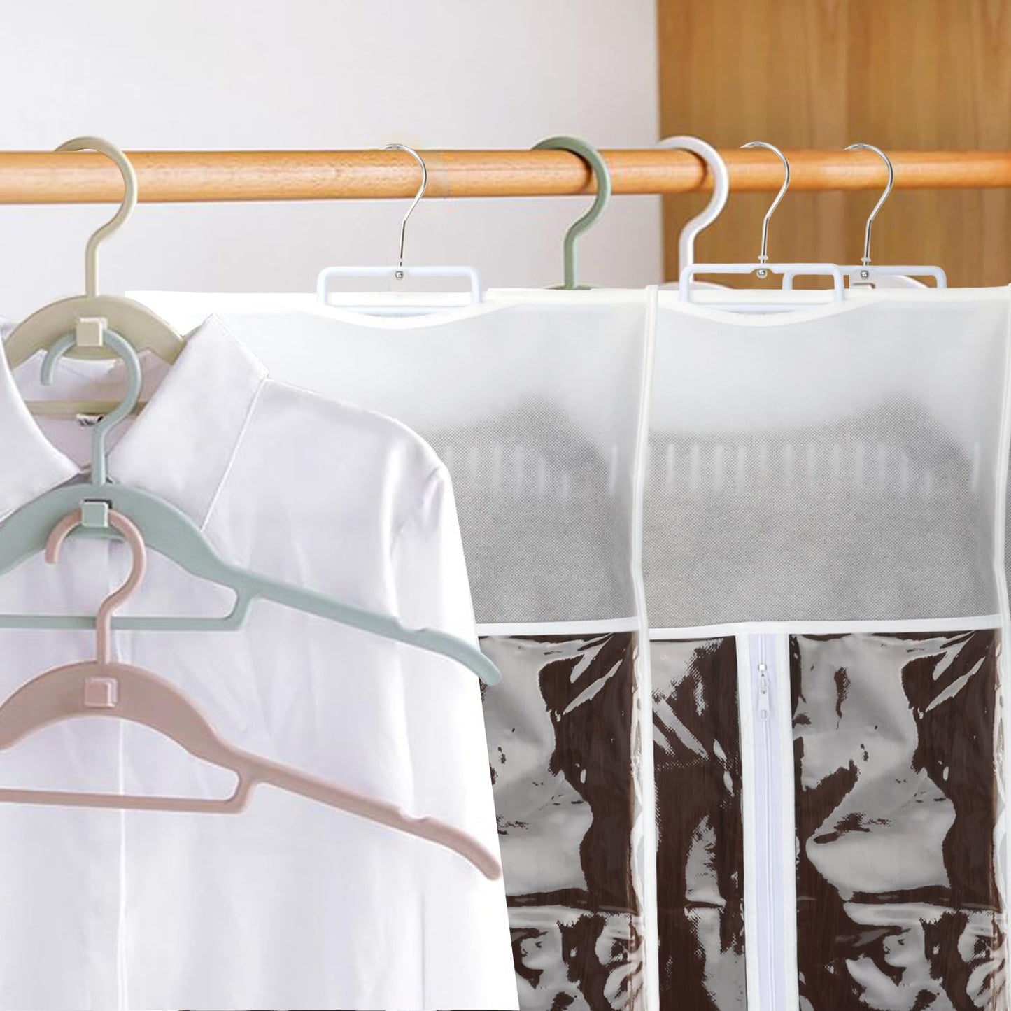 Kelukeya white weft hair holder inside the clear dust proof storage bag hanging in a closet wardrobe