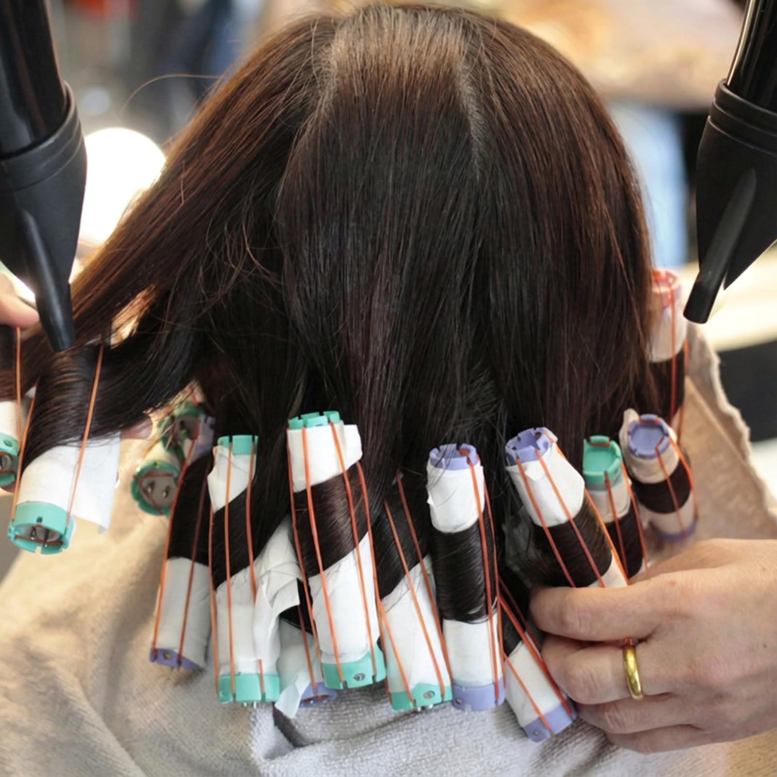 Disposable heat resistant end papers stacked neatly for salon hairdressing