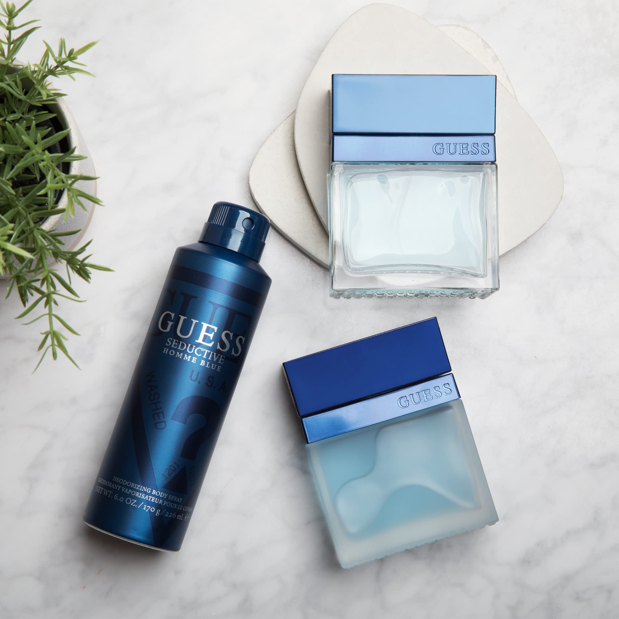Guess Seductive Homme Blue deodorizing body spray for men showing close up details of the premium spray nozzle