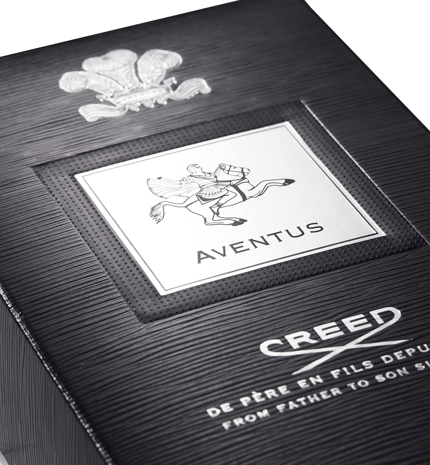 Side profile of Creed Aventus men's cologne bottle