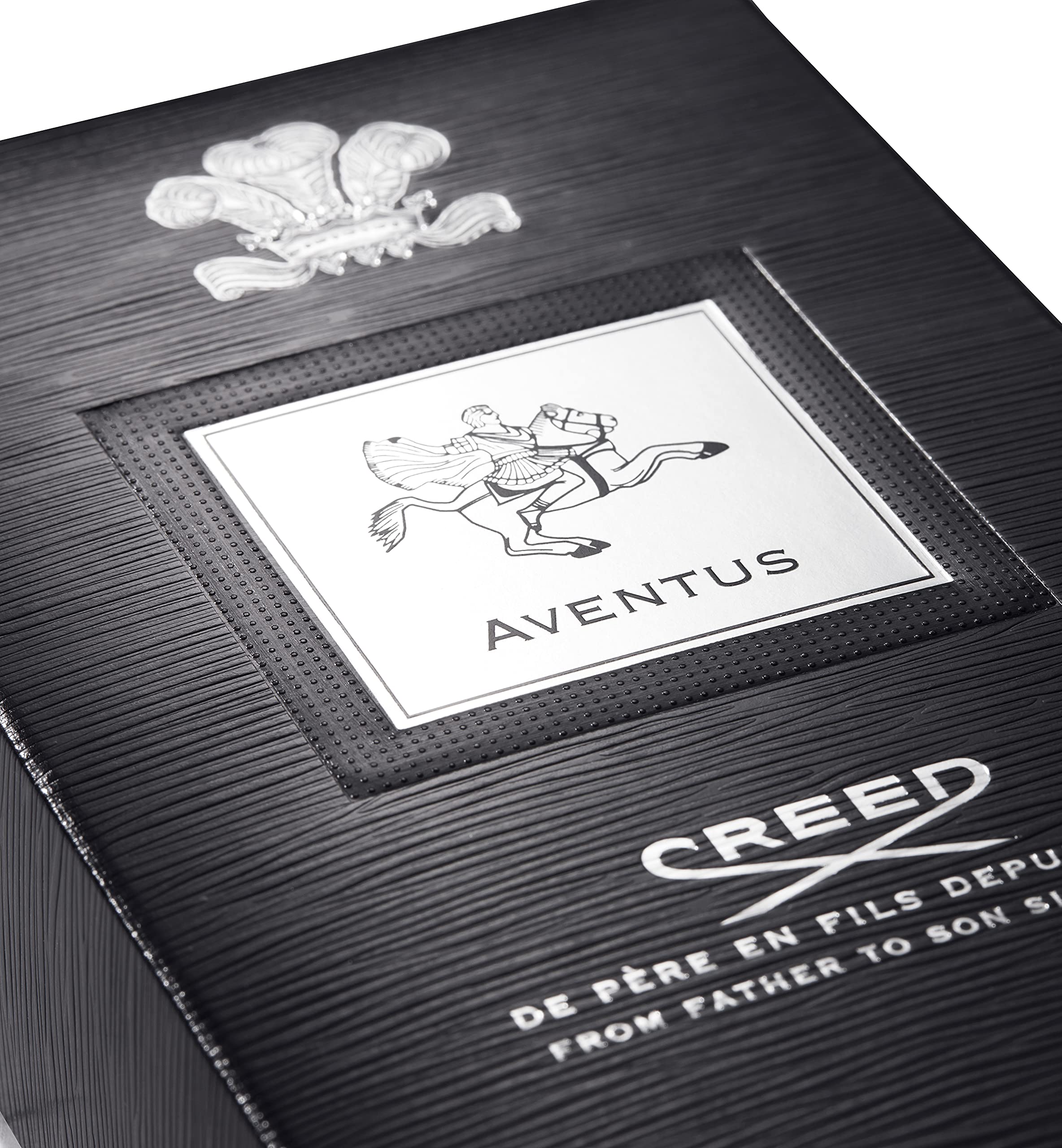 Side profile of Creed Aventus men's cologne bottle