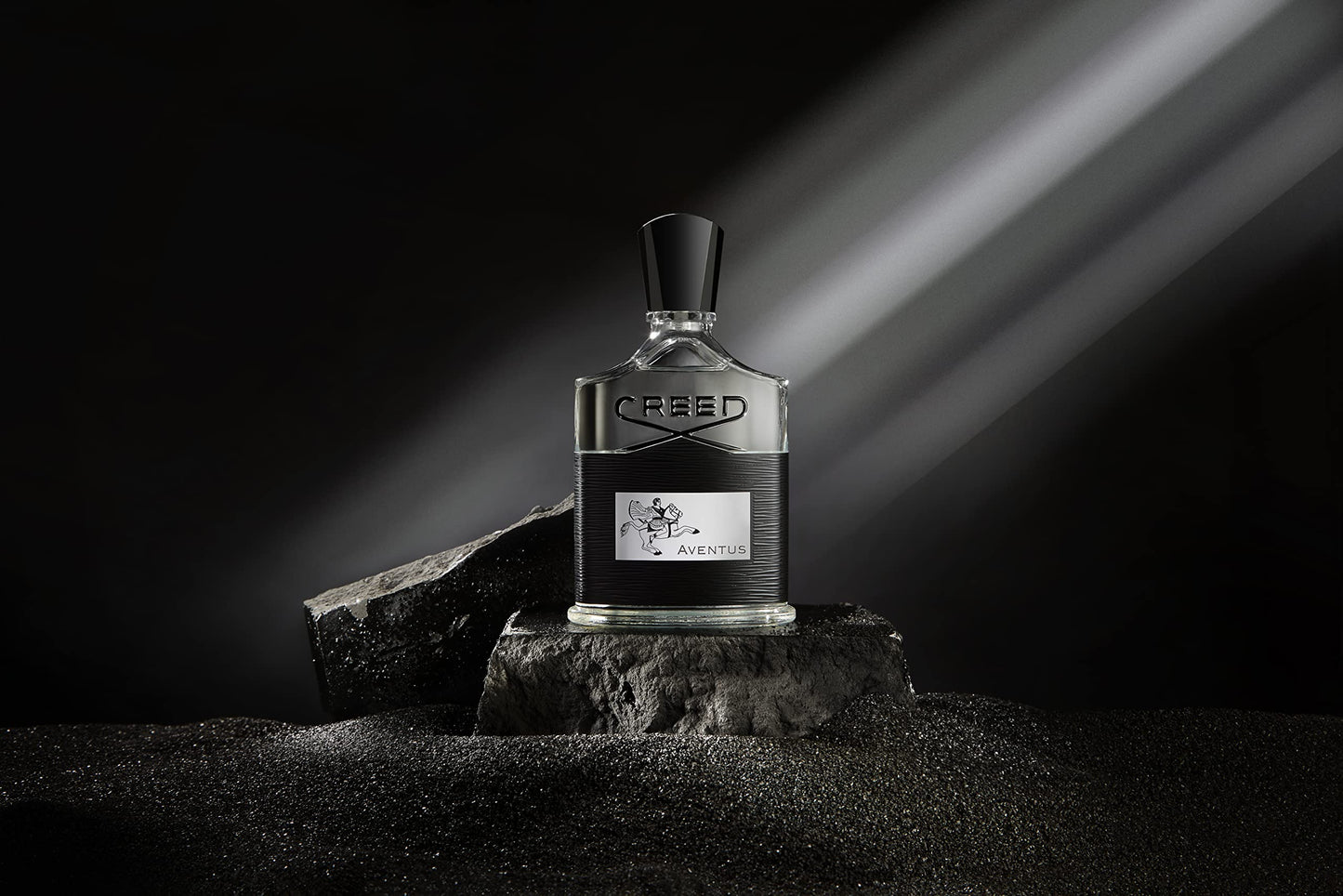 Detail of Aventus label on the fragrance bottle