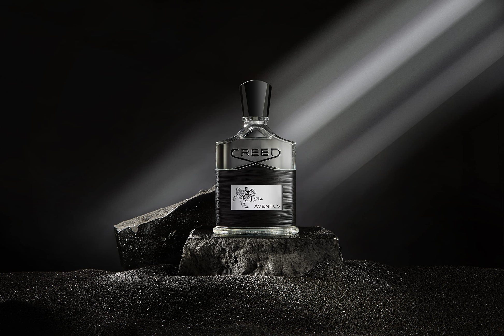 Detail of Aventus label on the fragrance bottle