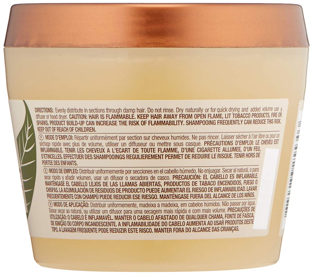 Texture shot of Mizani Twist And Coil styling gel highlighting the lightweight hydration formula