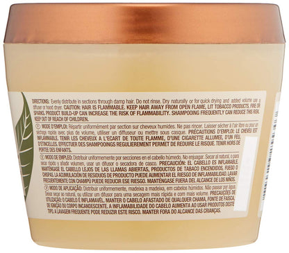 Texture shot of Mizani Twist And Coil styling gel highlighting the lightweight hydration formula