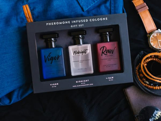 Three bottles of RawChemistry cologne including Vigor Midnight and Raw