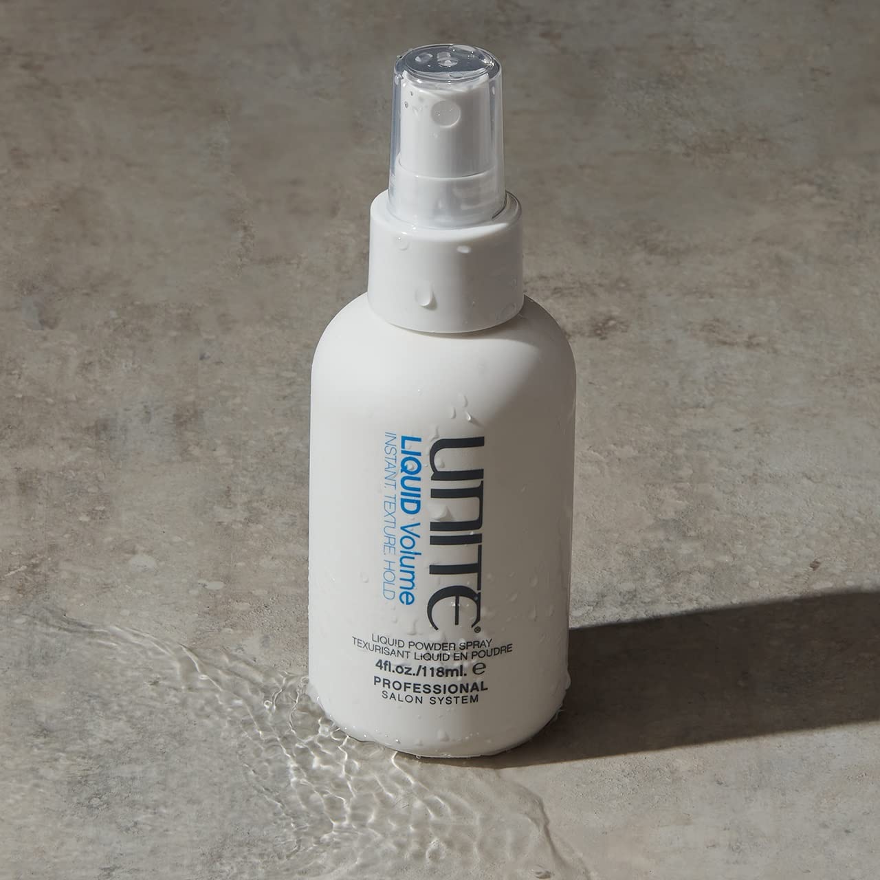 UNITE Hair texturizing liquid spray bottle showing product details and matte finish styling benefits